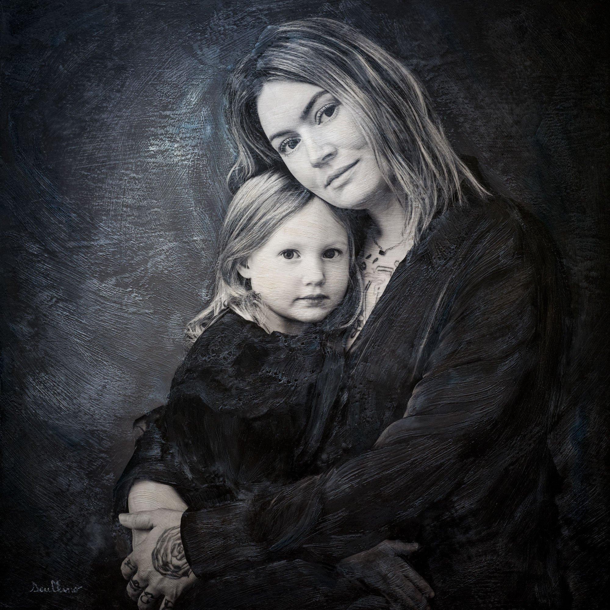 Mixed media black-and-white fine art portrait of a mother and daughter, capturing their bond and grace, created by Jerome Art Photography.