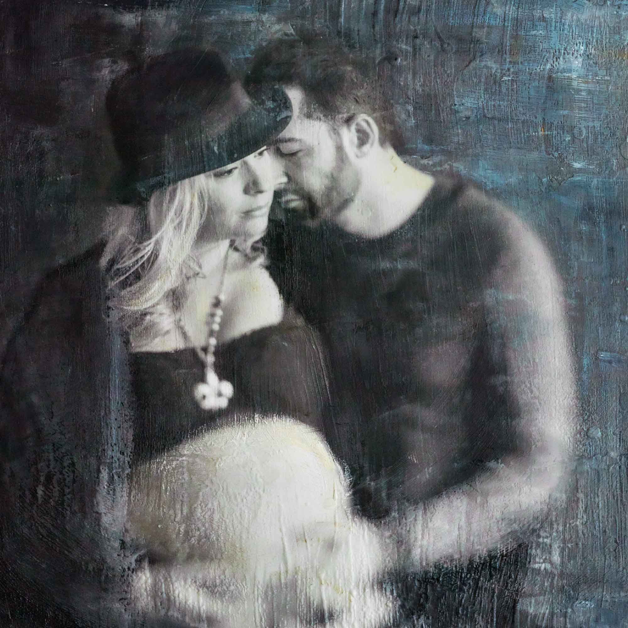 Mixed-media maternity portrait of a couple, soft focus with textured beeswax-and-oil surface on cotton rag.